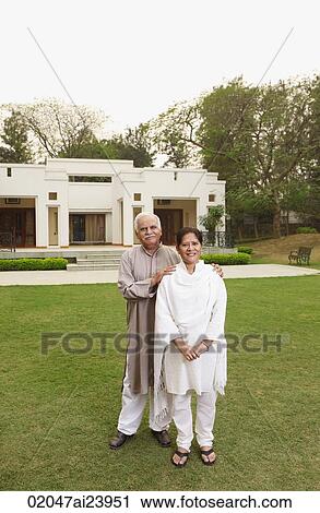 senior couple in front of home View Large Photo Image Stock Image - senior couple in front of home. Fotosearch