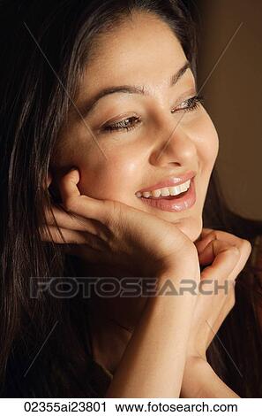 smiling woman with hands under chin (close up) View Large Photo Image Stock Image - smiling woman with hands under chin (close up). Fotosearch
