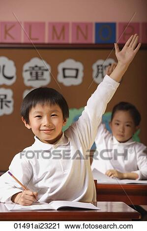 Students in class raising hands View Large Photo Image Stock Image - Students in class raising hands. Fotosearch