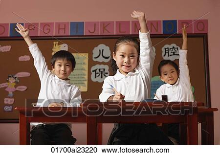 Students in class raising hands View Large Photo Image Stock Image - Students in class raising hands. Fotosearch