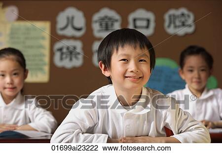Students sitting in class View Large Photo Image Stock Image - Students sitting in class. Fotosearch