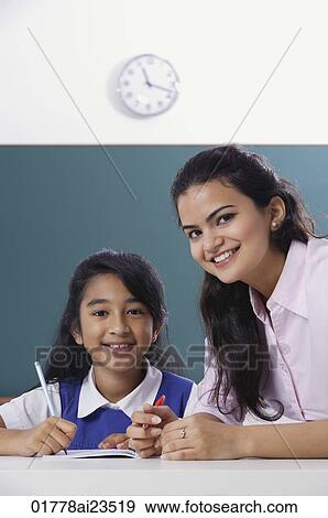 Stock Photo - teacher and student smile at camera (close up). Fotosearch