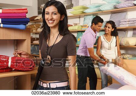 three people shopping in household store View Large Photo Image Stock Image - three people shopping in household store. Fotosearch