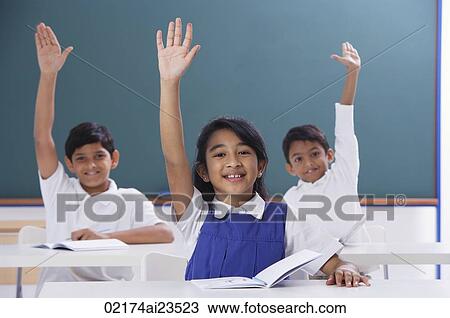 three students with raised hands View Large Photo Image Stock Image - three students with raised hands. Fotosearch