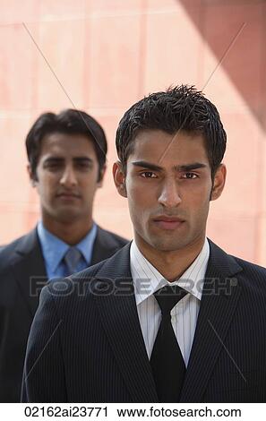 Stock Image - two businessmen (vertical). Fotosearch