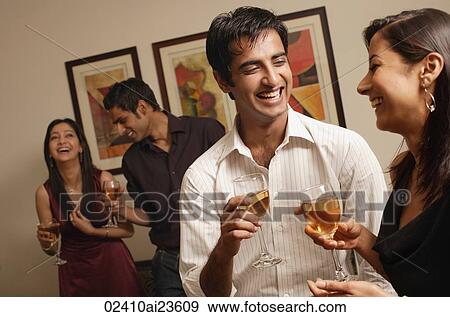 two couples at party, laughing View Large Photo Image Stock Photo - two couples at party, laughing. Fotosearch