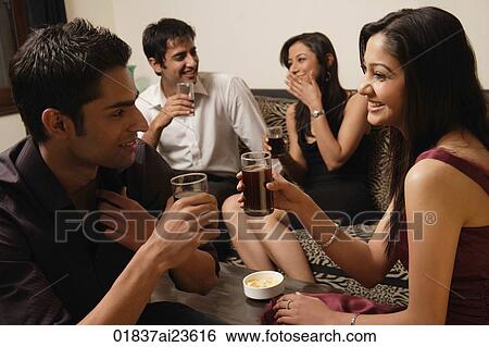 two couples talking at a party View Large Photo Image Stock Photograph - two couples talking at a party. Fotosearch