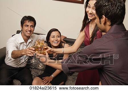 two couples toasting each other View Large Photo Image Stock Photography - two couples toasting each other. Fotosearch