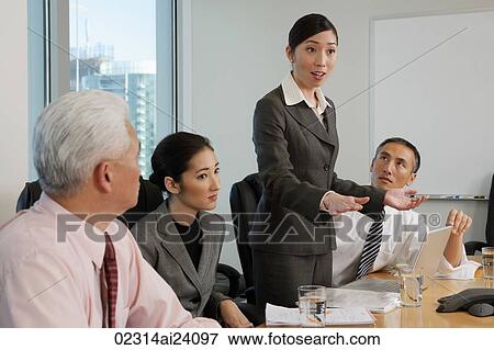 woman presenting at meeting View Large Photo Image Stock Photo - woman presenting at meeting. Fotosearch