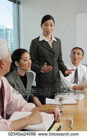 woman presenting at meeting View Large Photo Image Stock Photo - woman presenting at meeting. Fotosearch