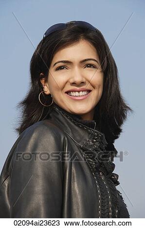 woman smiling in leather jacket (vertical) View Large Photo Image Stock Image - woman smiling in leather jacket (vertical). Fotosearch