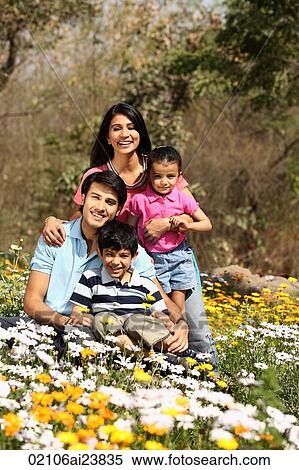 Young family in park View Large Photo Image Stock Photography - Young family in park. Fotosearch