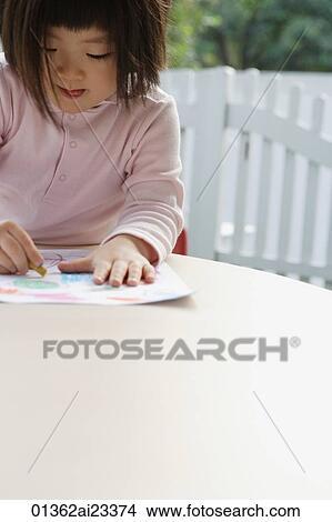 Young girl drawing pictures View Large Photo Image Picture - Young girl drawing pictures. Fotosearch