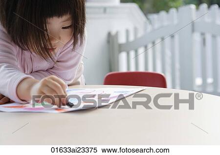 Young girl drawing pictures View Large Photo Image Stock Photography - Young girl drawing pictures. Fotosearch