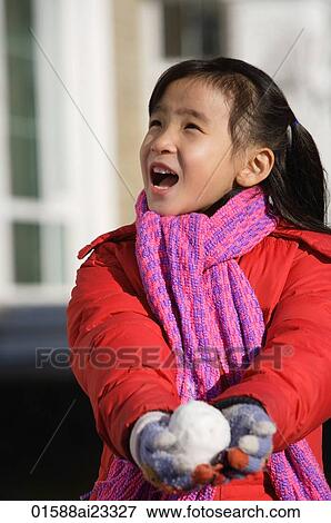 Young girl with snowball View Large Photo Image Stock Photo - Young girl with snowball. Fotosearch