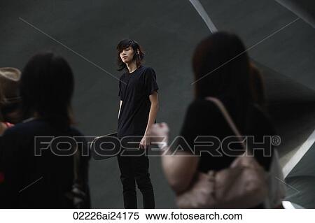 youth holding skateboard, in crowd View Large Photo Image Stock Photography - youth holding skateboard, in crowd. Fotosearch
