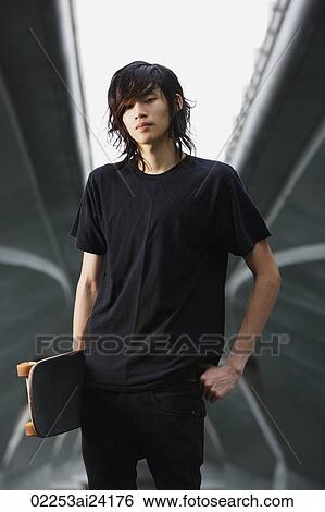 youth holding skateboard View Large Photo Image Stock Photograph - youth holding skateboard. Fotosearch