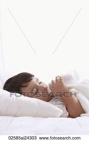 baby boy, asleep with bottle View Large Photo Image Stock Image - baby boy, asleep with bottle. Fotosearch