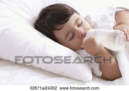 baby boy, asleep with bottle View Large Photo Image Stock Image - baby boy, asleep with bottle. Fotosearch