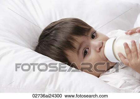baby boy drinking from bottle View Large Photo Image Stock Image - baby boy drinking from bottle. Fotosearch