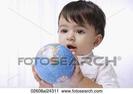 baby boy holding globe View Large Photo Image Stock Image - baby boy holding globe. Fotosearch