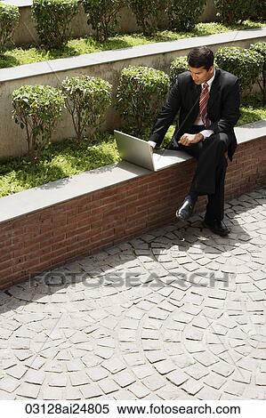 businessman, laptop computer, outside View Large Photo Image Stock Photography - businessman, laptop computer, outside. Fotosearch