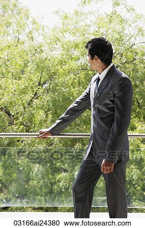 businessman on balcony View Large Photo Image Stock Image - businessman on balcony. Fotosearch