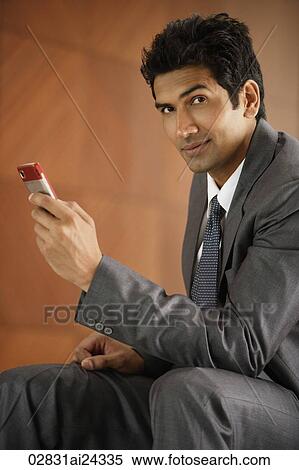 businessman on mobile phone View Large Photo Image Stock Photography - businessman on mobile phone. Fotosearch