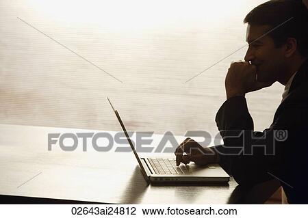 businessman working on laptop computer View Large Photo Image Stock Image - businessman working on laptop computer. Fotosearch