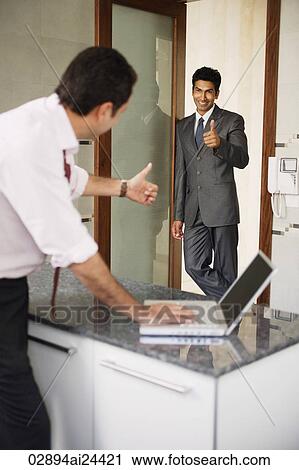 businessmen giving "thumbs up" sign, laptop computer View Large Photo Image Stock Image - businessmen giving "thumbs up" sign, laptop computer. Fotosearch