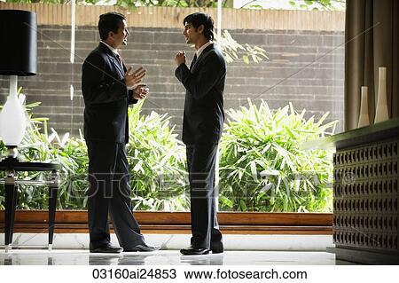 businessmen in hotel lobby View Large Photo Image Stock Image - businessmen in hotel lobby. Fotosearch