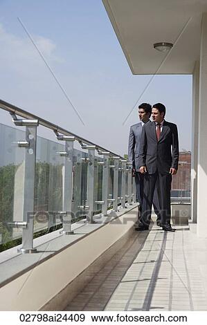 businessmen on balcony View Large Photo Image Stock Photo - businessmen on balcony. Fotosearch