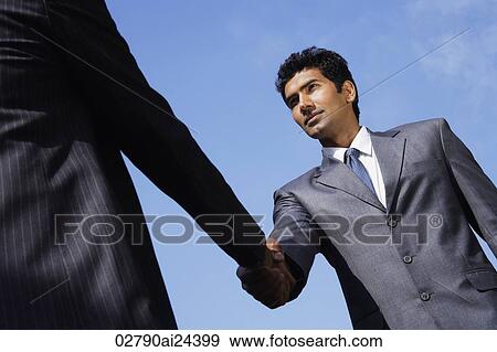 Stock Photo - businessmen shaking hands. Fotosearch