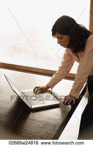 businesswoman at laptop computer View Large Photo Image Stock Photo - businesswoman at laptop computer. Fotosearch