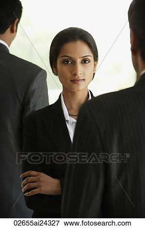 businesswoman surrounded by businessmen View Large Photo Image Stock Photo - businesswoman surrounded by businessmen. Fotosearch