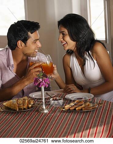 couple at restaurant, toasting View Large Photo Image Stock Image - couple at restaurant, toasting. Fotosearch