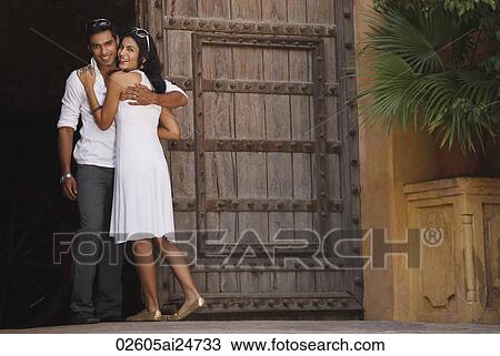 Stock Image - couple embracing. Fotosearch