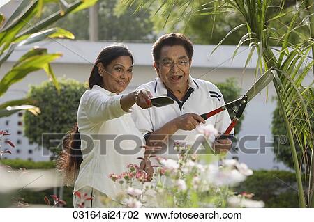 Stock Image - couple gardening. Fotosearch
