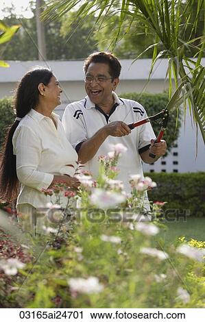 Stock Image - couple gardening. Fotosearch