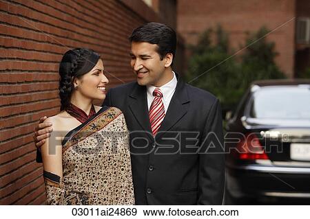 couple in front of car, woman in sari View Large Photo Image Stock Photo - couple in front of car, woman in sari. Fotosearch