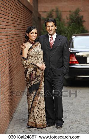 couple in front of car, woman in sari View Large Photo Image Stock Photo - couple in front of car, woman in sari. Fotosearch