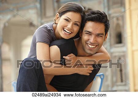 Picture - couple laughing. Fotosearch