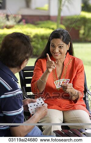 couple playing cards outside View Large Photo Image Stock Image - couple playing cards outside. Fotosearch