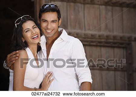 couple smiling, embracing View Large Photo Image Stock Image - couple smiling, embracing. Fotosearch