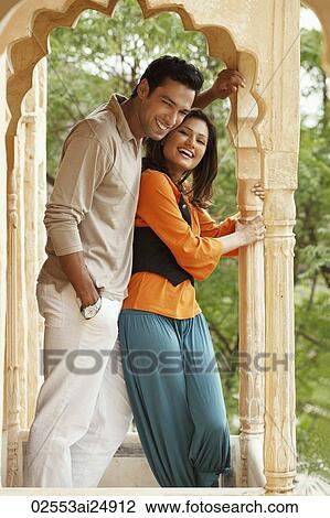 couple standing on balcony View Large Photo Image Stock Image - couple standing on balcony. Fotosearch