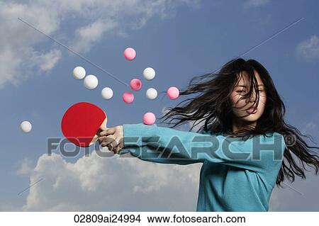 lady hitting ping pong balls View Large Photo Image Picture - lady hitting ping pong balls. Fotosearch