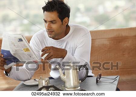 man reading newspaper View Large Photo Image Stock Image - man reading newspaper. Fotosearch