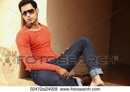 Stock Photo - man reclining in sunshine. Fotosearch