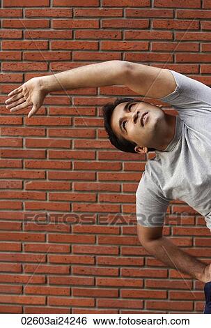 man stretching View Large Photo Image Stock Photograph - man stretching. Fotosearch
