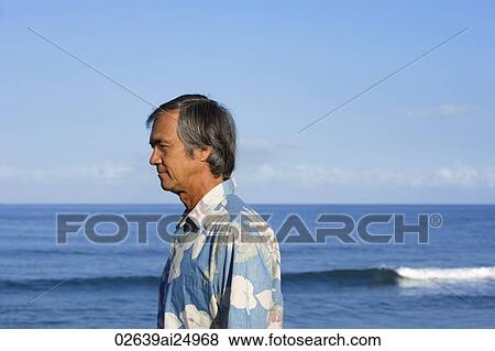 mature man looking out to sea View Large Photo Image Stock Photo - mature man looking out to sea. Fotosearch